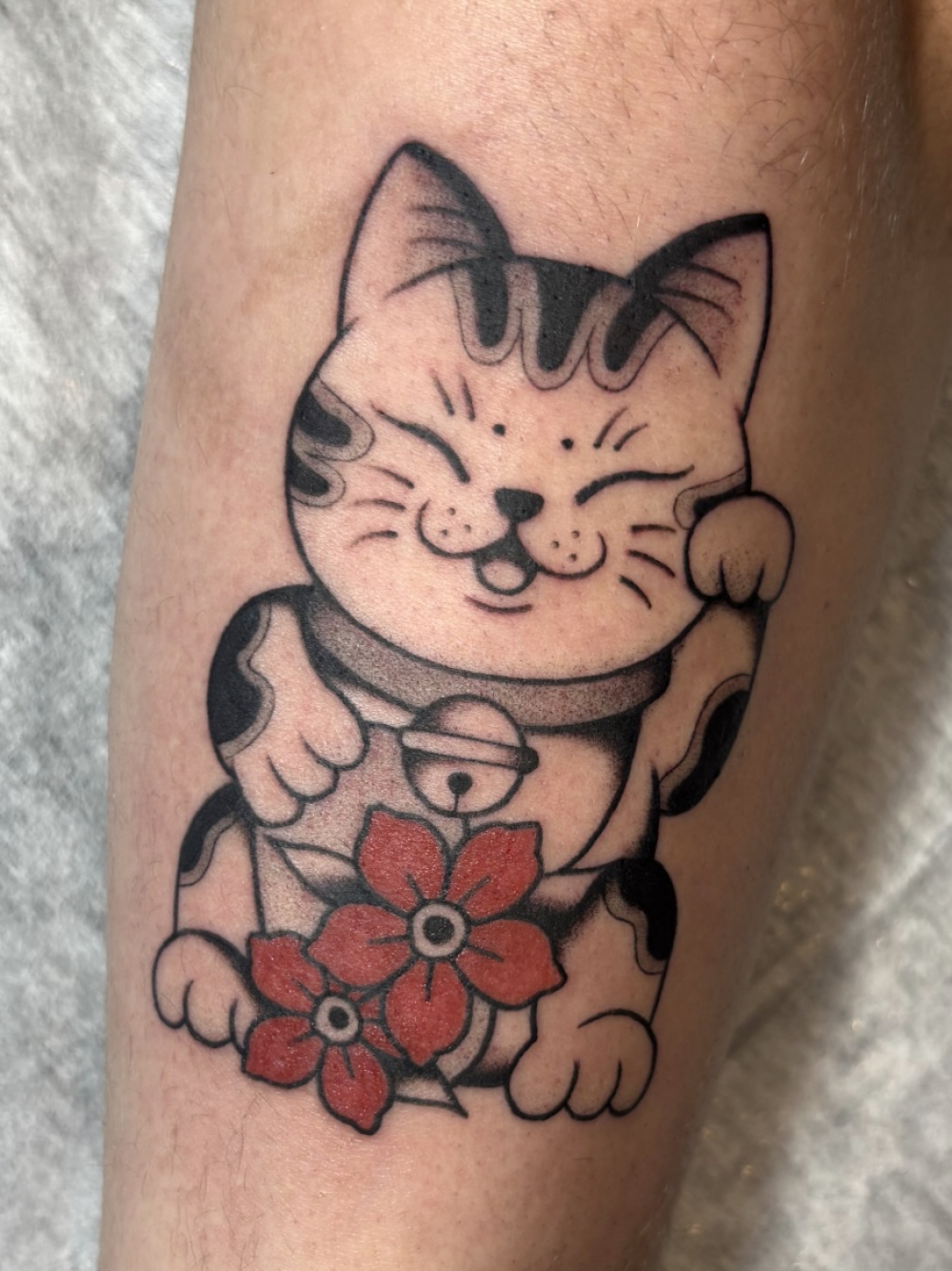 招き猫のタトゥー
